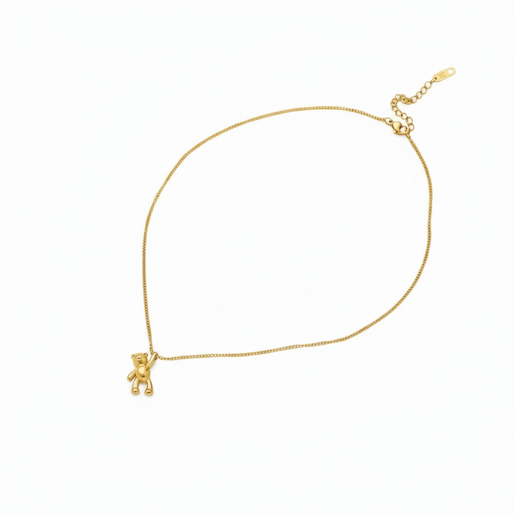 Teddy bear necklace with A U R A background